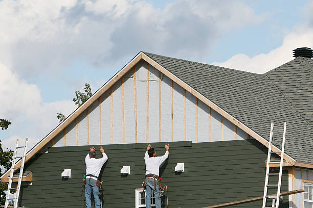 Professional Siding Contractor technician working in Pelham, NC